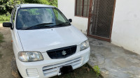 White Maruti Suzuki Alto lxi