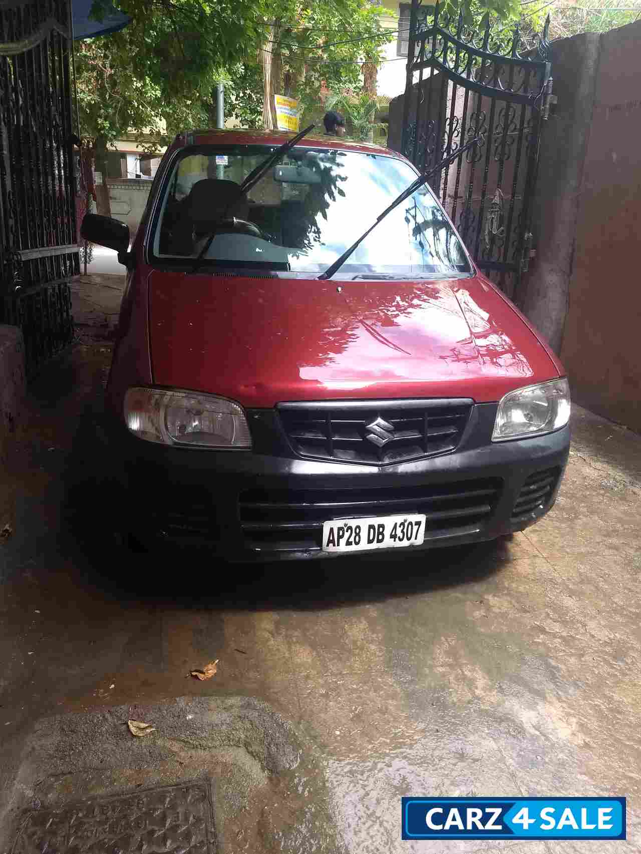 Wine Red Maruti Suzuki Alto LXi BS-III