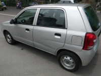 Silver Maruti Suzuki 1000 AC