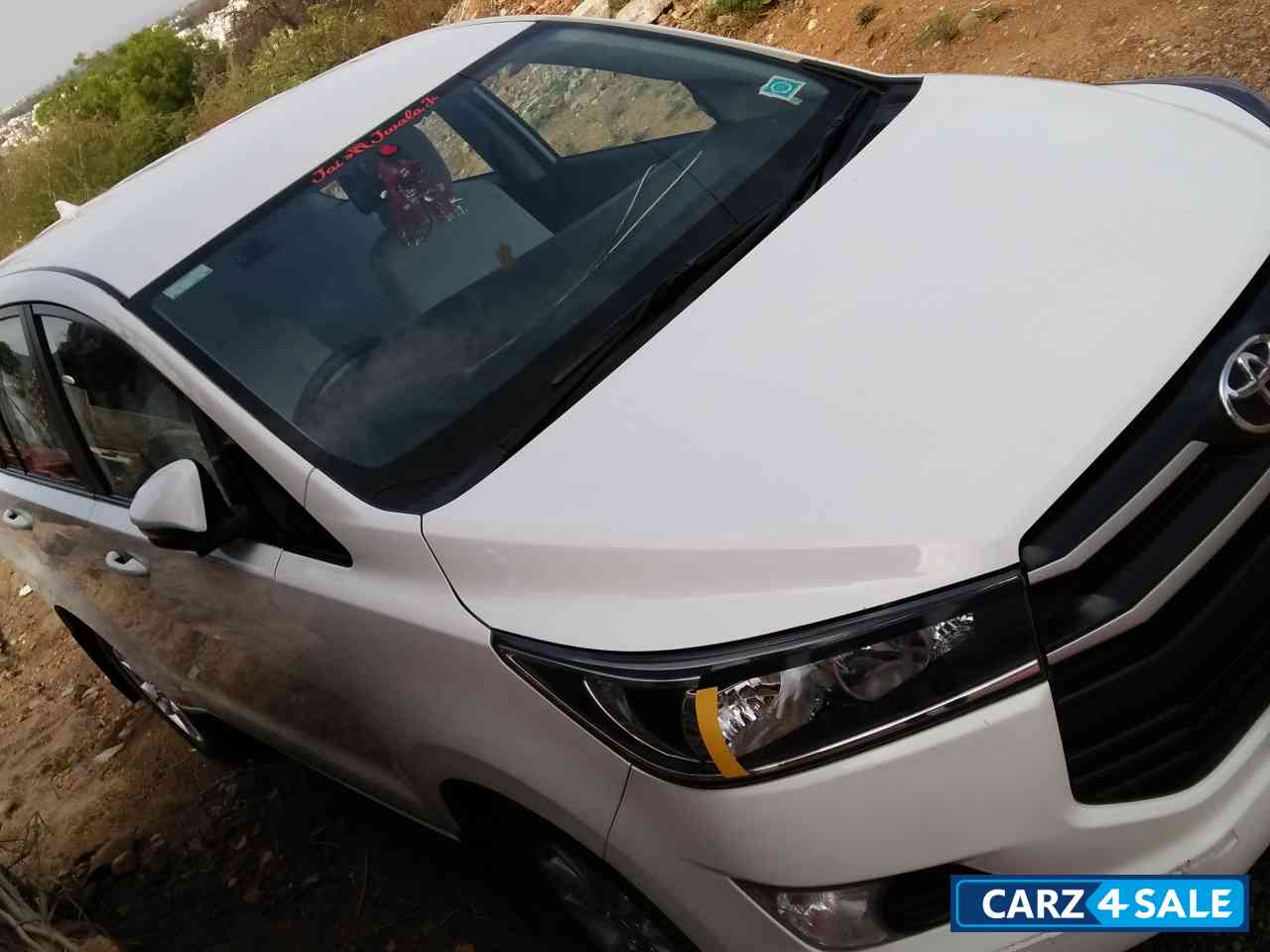 White Toyota Innova Crysta Diesel