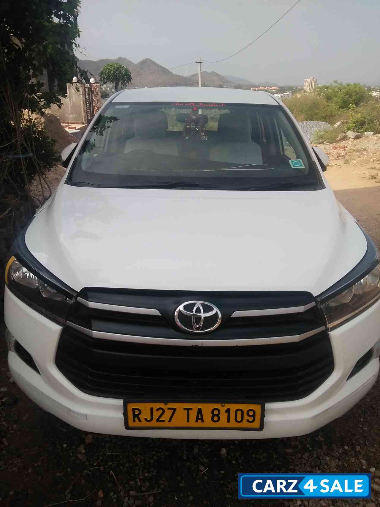 White Toyota Innova Crysta Diesel