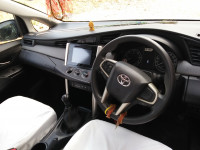 White Toyota Innova Crysta Diesel