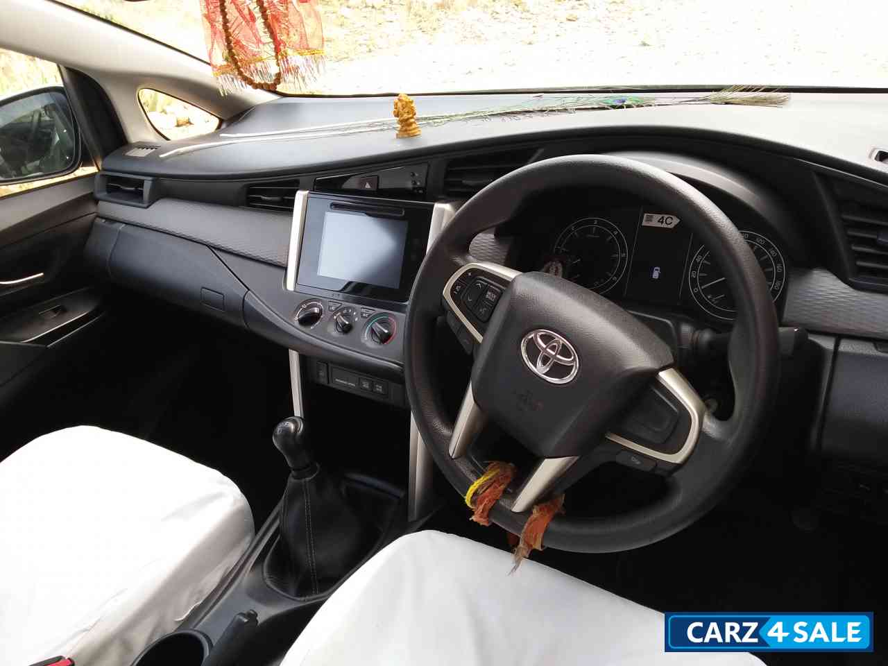 White Toyota Innova Crysta Diesel