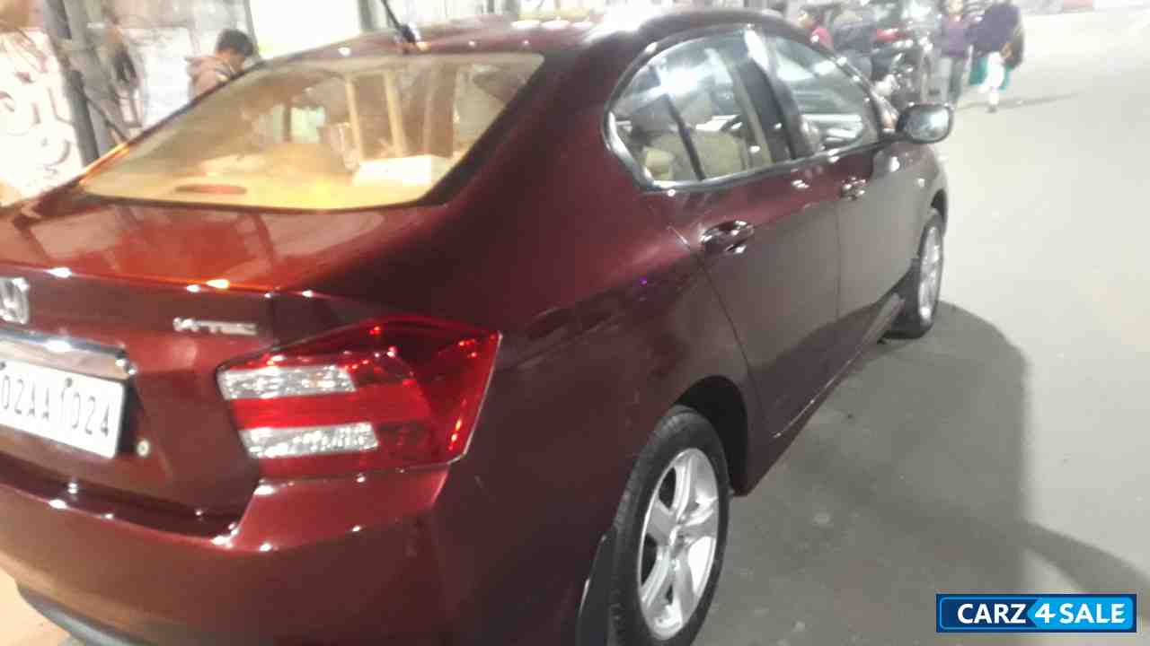 Maroonish Red Honda City 1.5 V AT