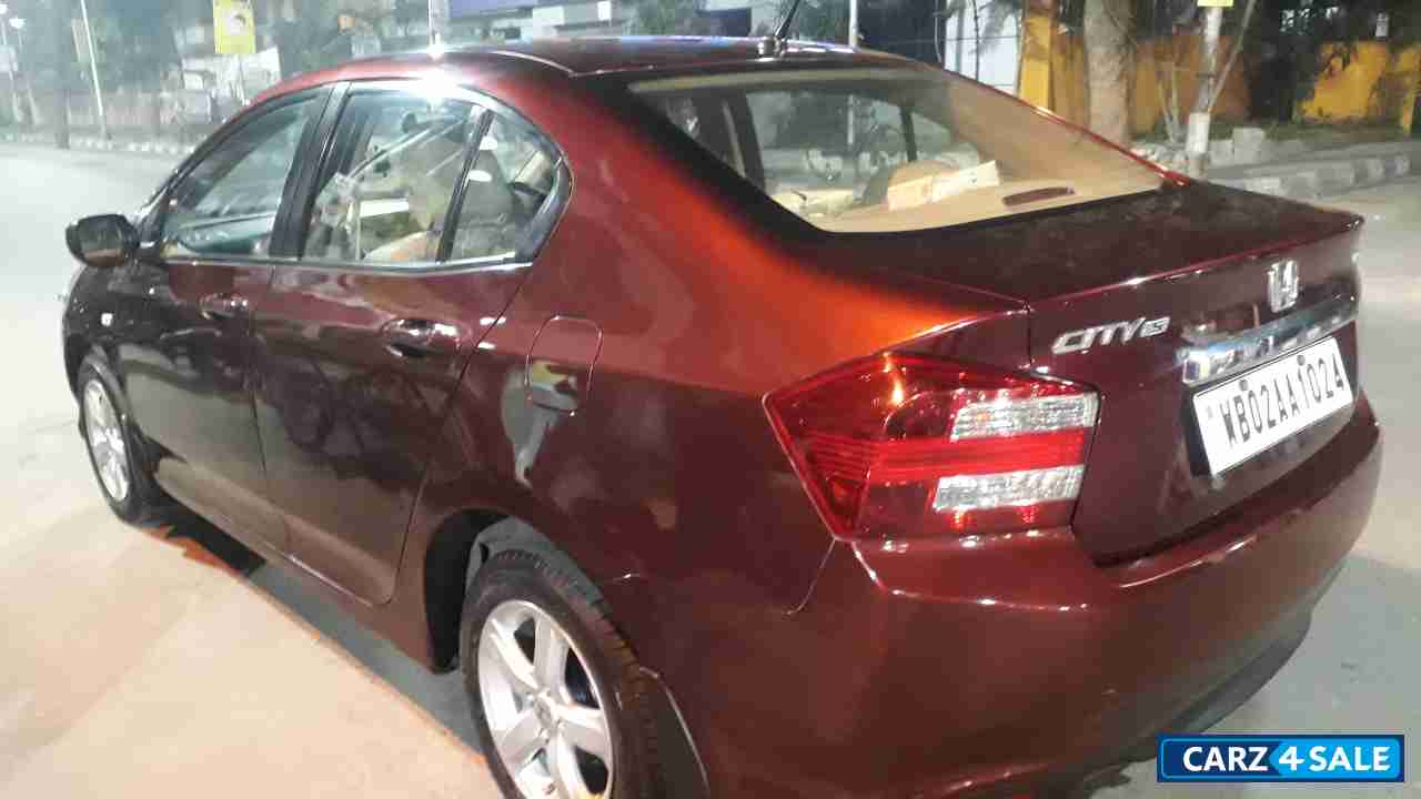 Maroonish Red Honda City 1.5 V AT