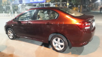 Maroonish Red Honda City 1.5 V AT
