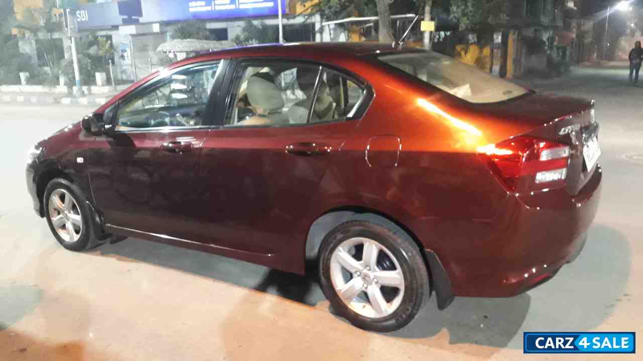 Maroonish Red Honda City 1.5 V AT