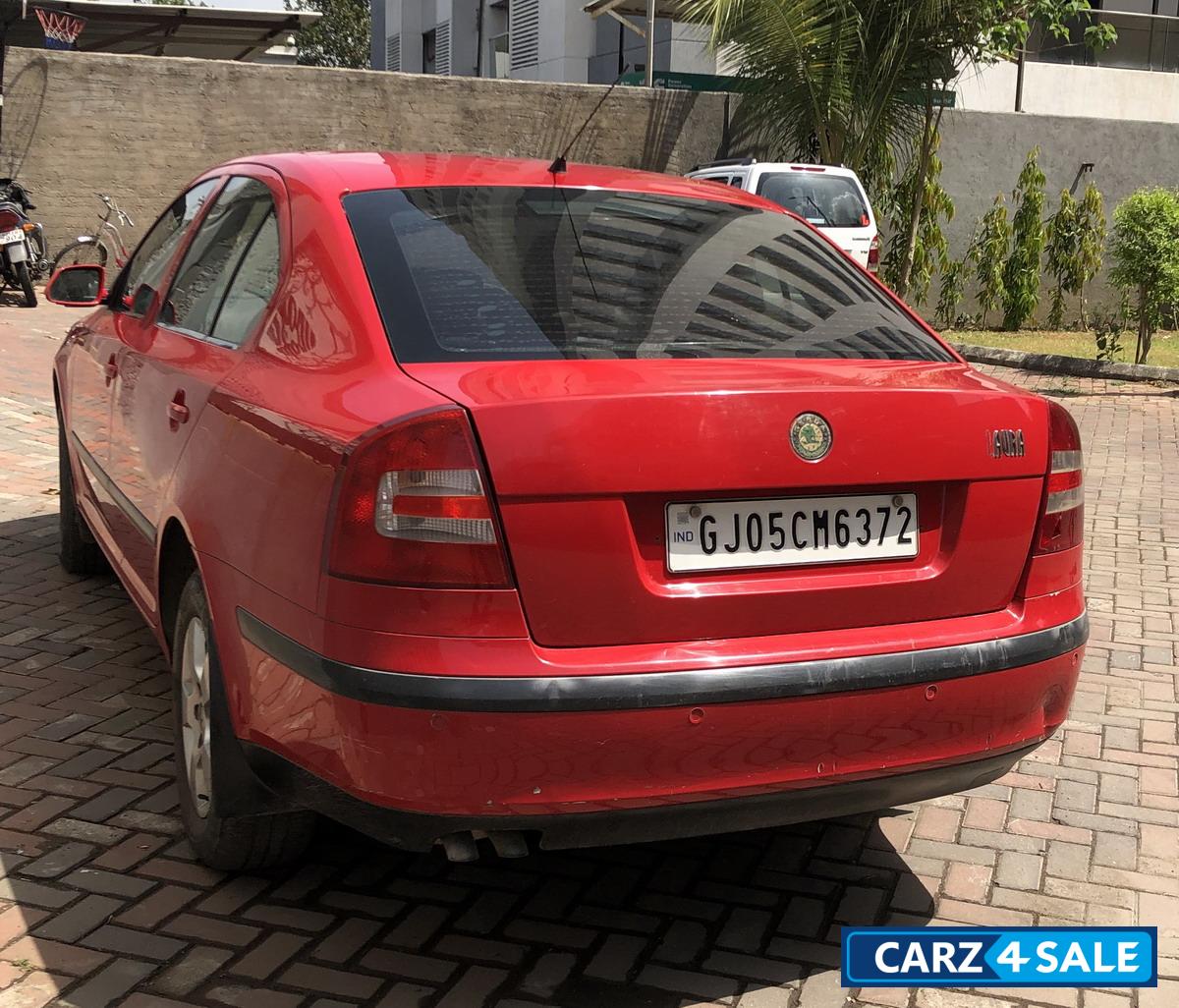 Red Skoda Laura Ambiente 1.9 TDI MT