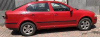 Red Skoda Laura Ambiente 1.9 TDI MT