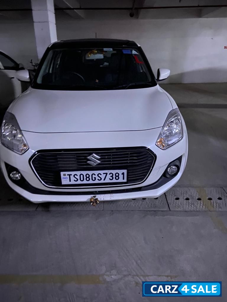 Pearl White Maruti Suzuki Swift VXI