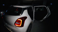 Pearl White Maruti Suzuki Swift VXI