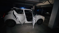Pearl White Maruti Suzuki Swift VXI
