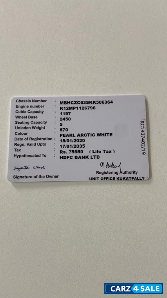 Pearl White Maruti Suzuki Swift VXI