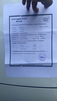 Pearl White Maruti Suzuki Swift VXI