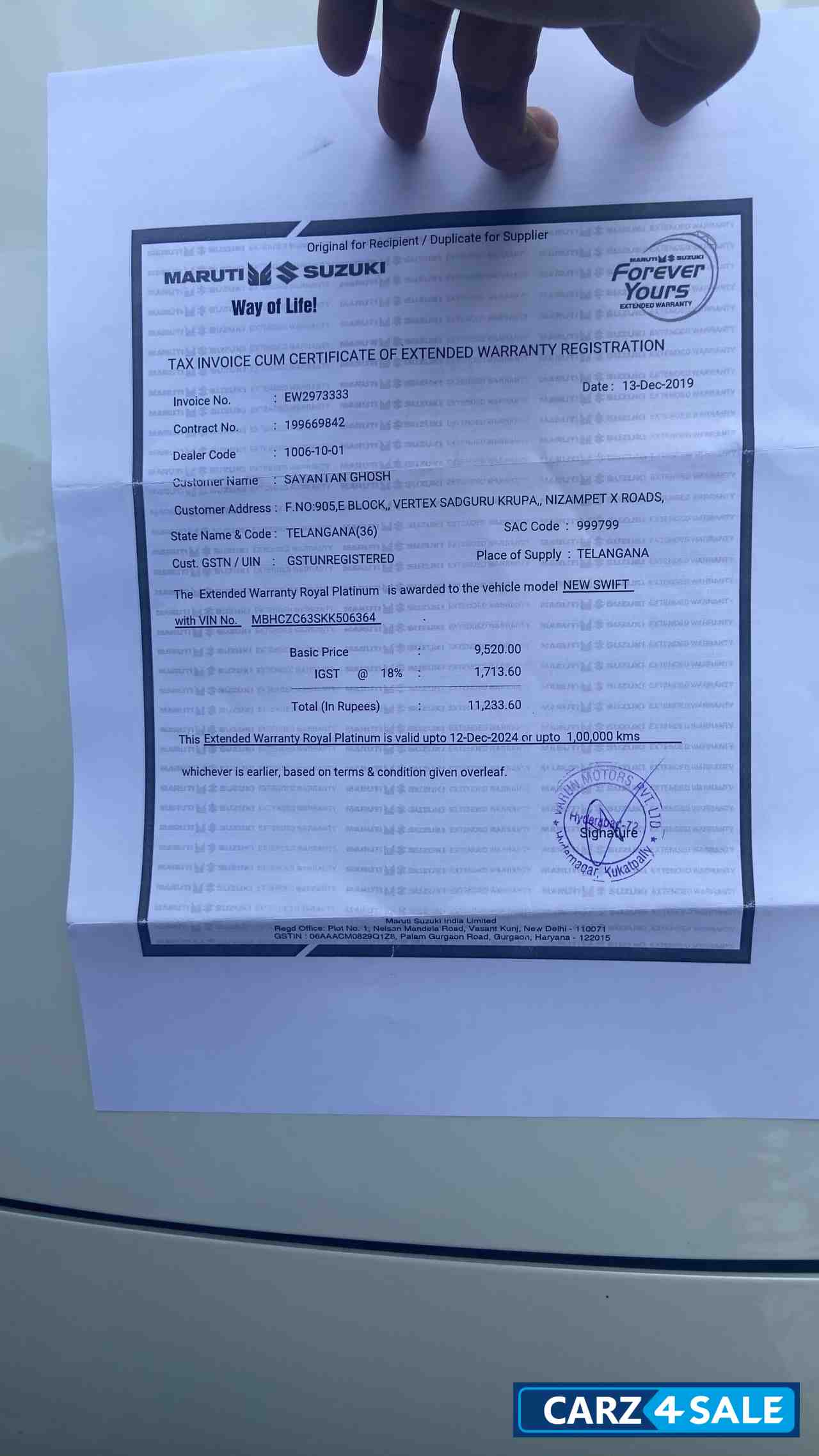 Pearl White Maruti Suzuki Swift VXI