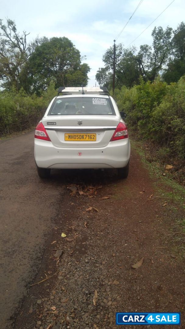 Pearl Arctic White Maruti Suzuki Dzire Tour S Petrol + CNG