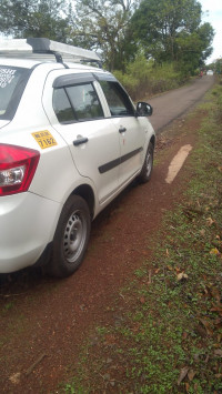 Pearl Arctic White Maruti Suzuki Dzire Tour S Petrol + CNG