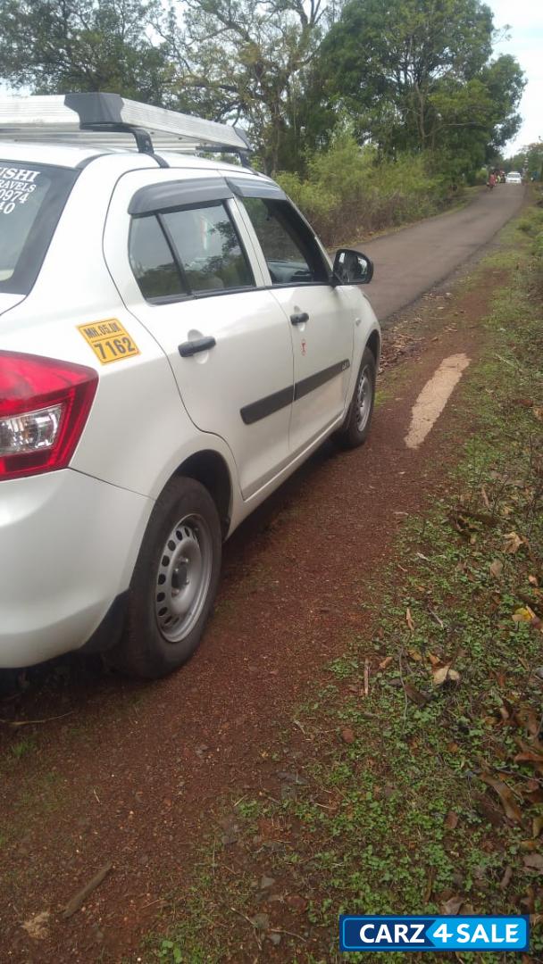 Pearl Arctic White Maruti Suzuki Dzire Tour S Petrol + CNG