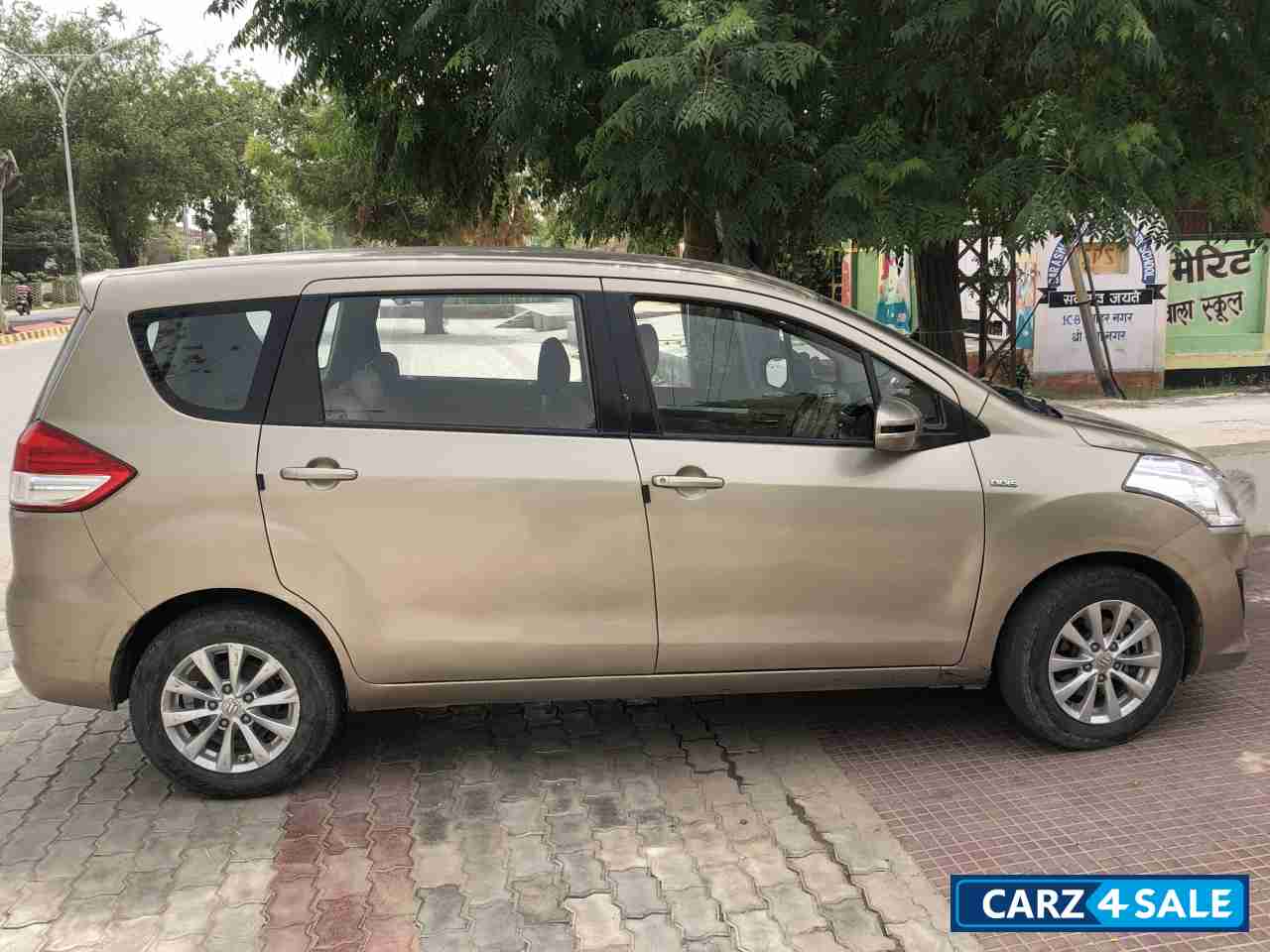 Golden Maruti Suzuki Ertiga ZDI