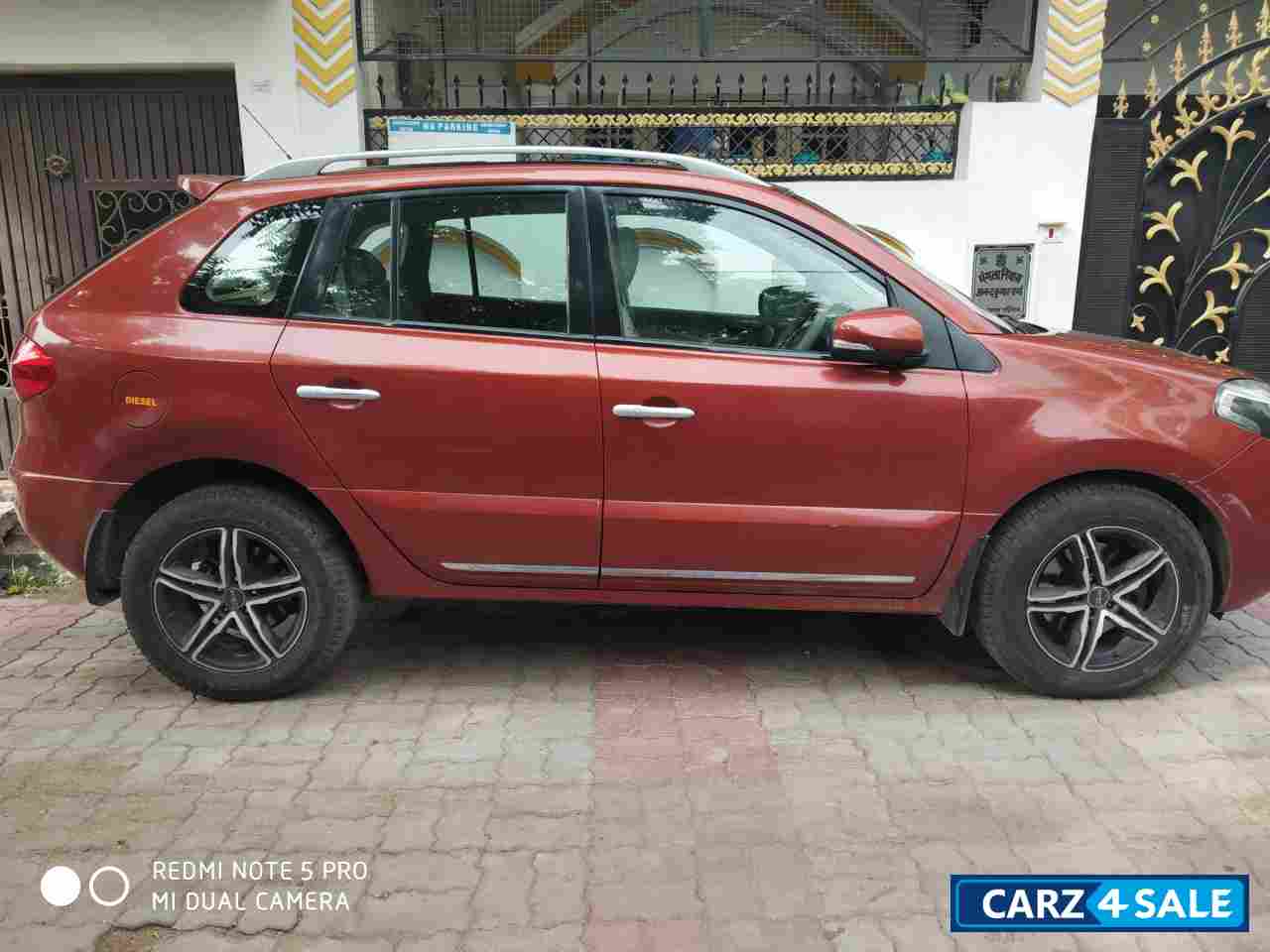 Red Renault Koleos 4x4 AT