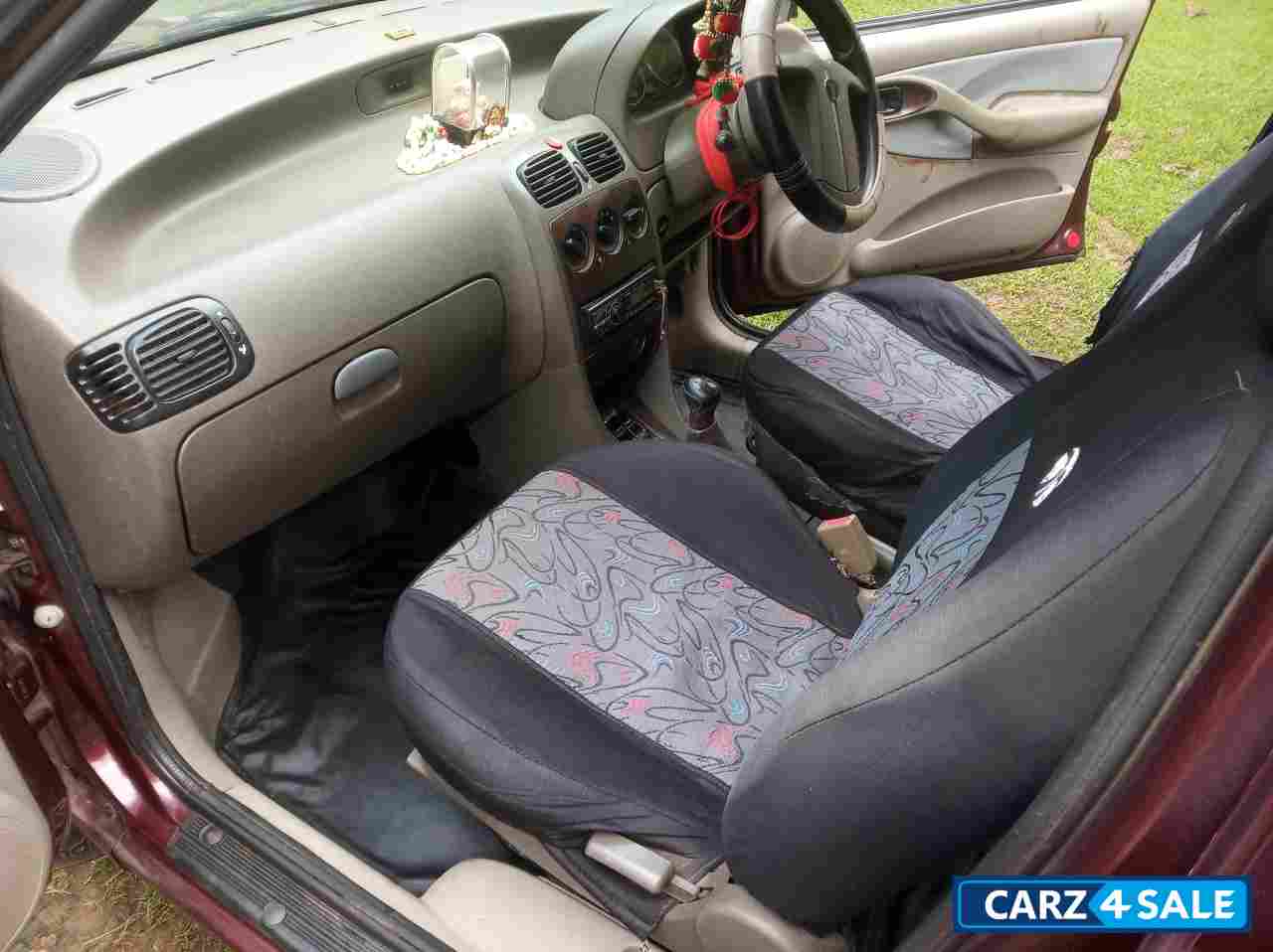 Royal Burgundy Tata Indigo eCS LX TDI BS-III