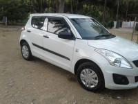 White Maruti Suzuki Swift LXI