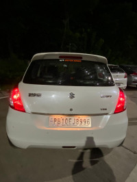 White Maruti Suzuki Swift VDi BS-IV