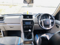 White Mahindra Scorpio S10 4WD