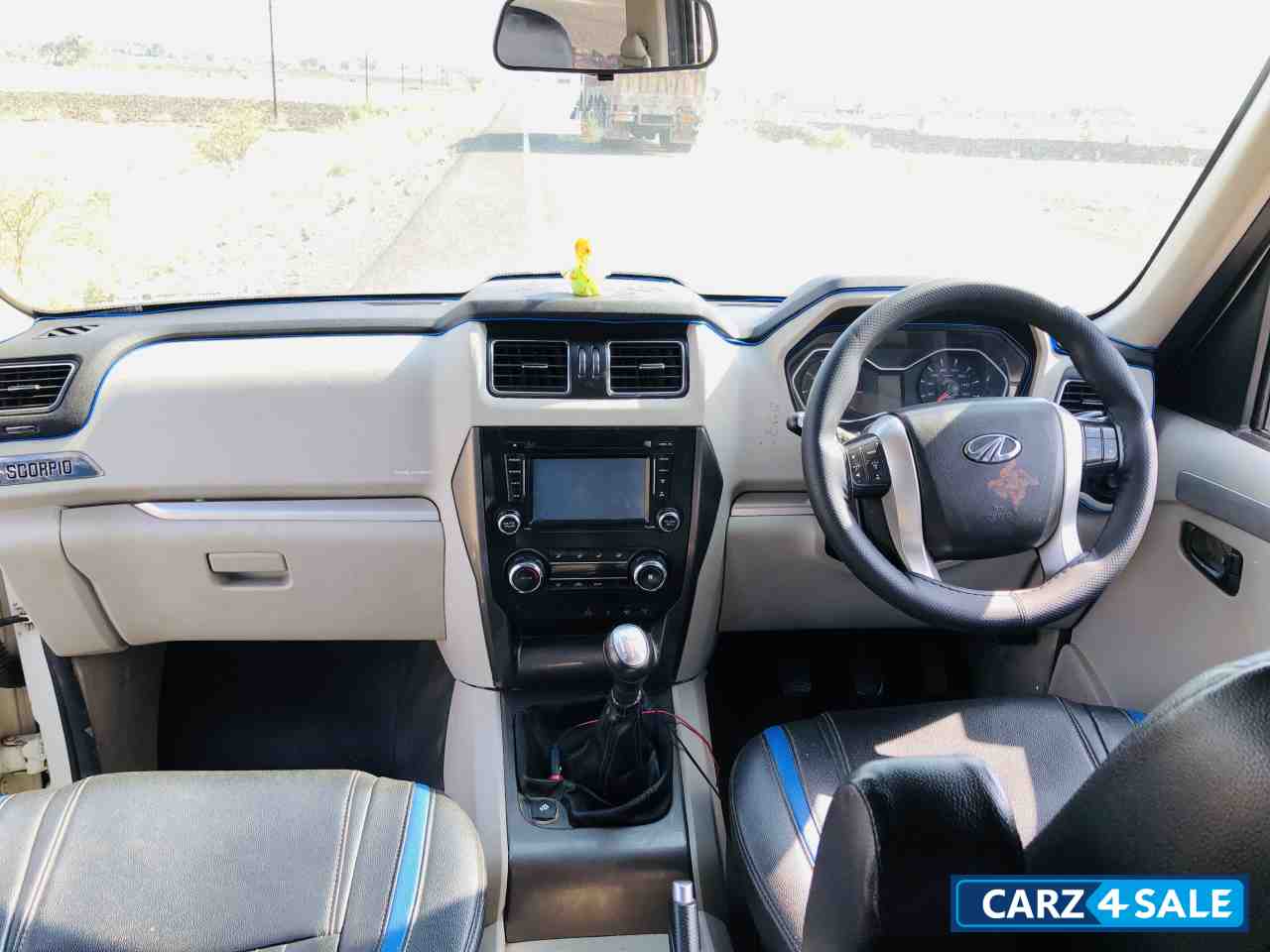 White Mahindra Scorpio S10 4WD