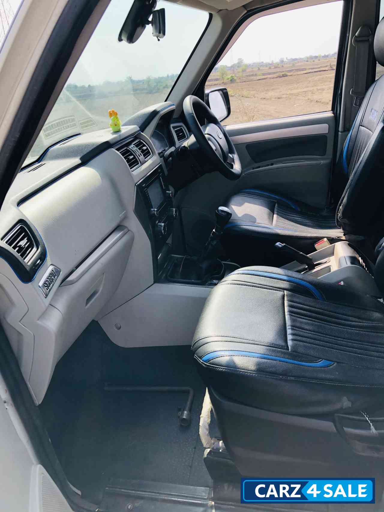 White Mahindra Scorpio S10 4WD