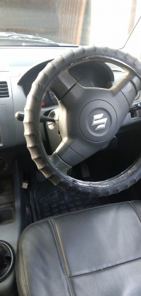 Silky Silver Maruti Suzuki Swift LXI