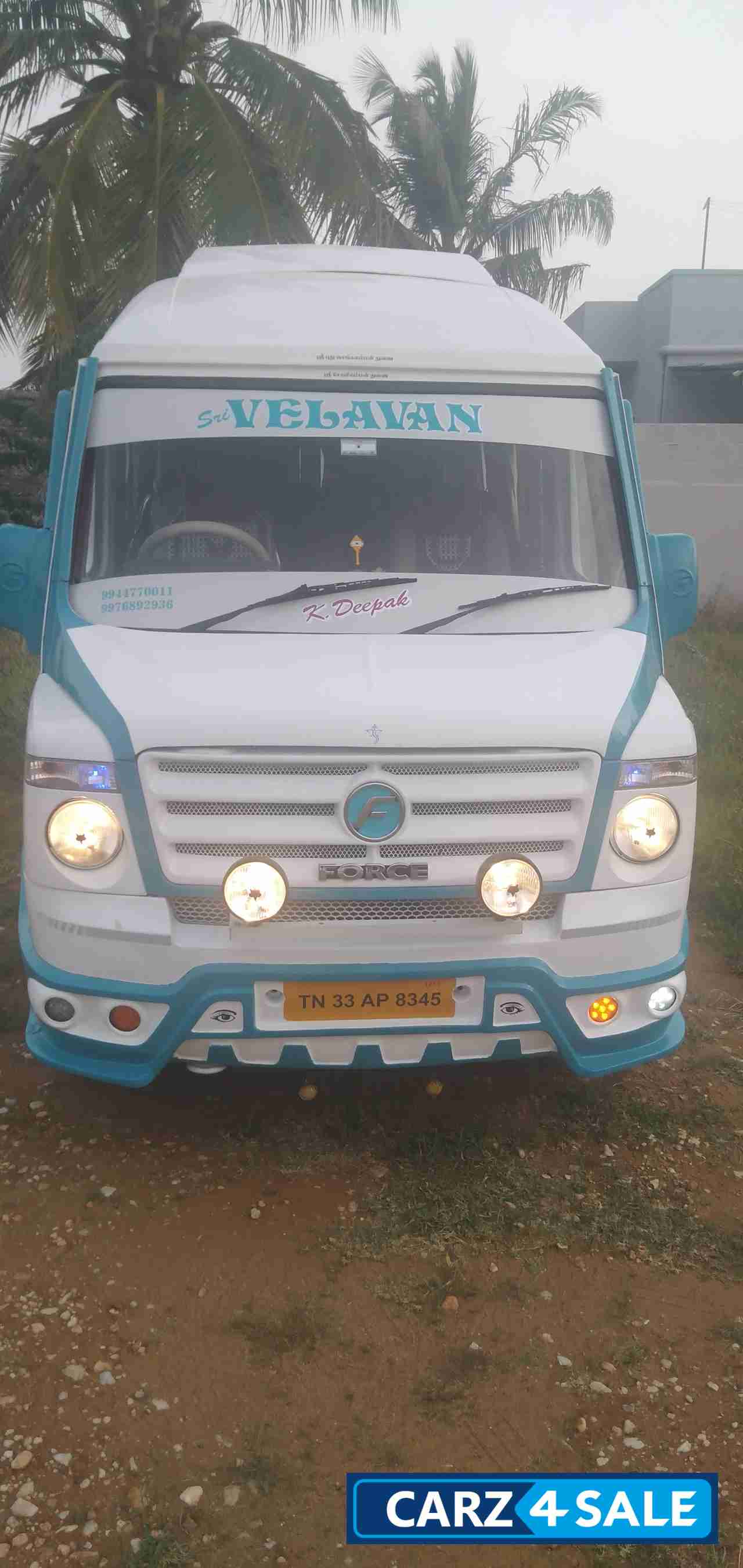 White And Blue Force Motors Commercial Traveller