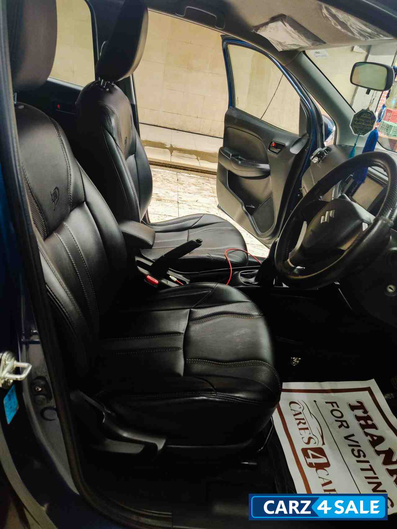 Blue Maruti Suzuki Baleno Sigma 1.2