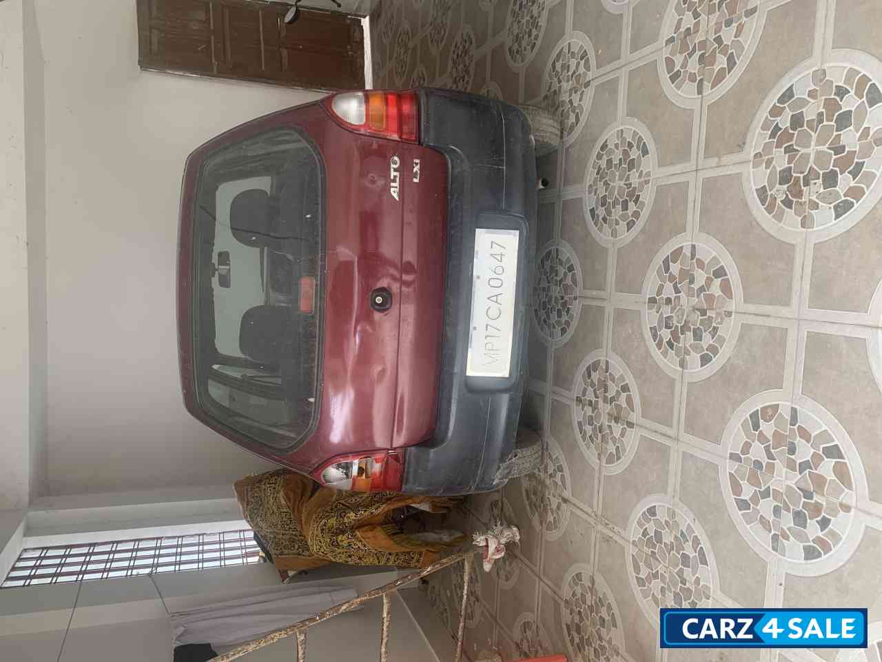 Wine Red Maruti Suzuki LXI