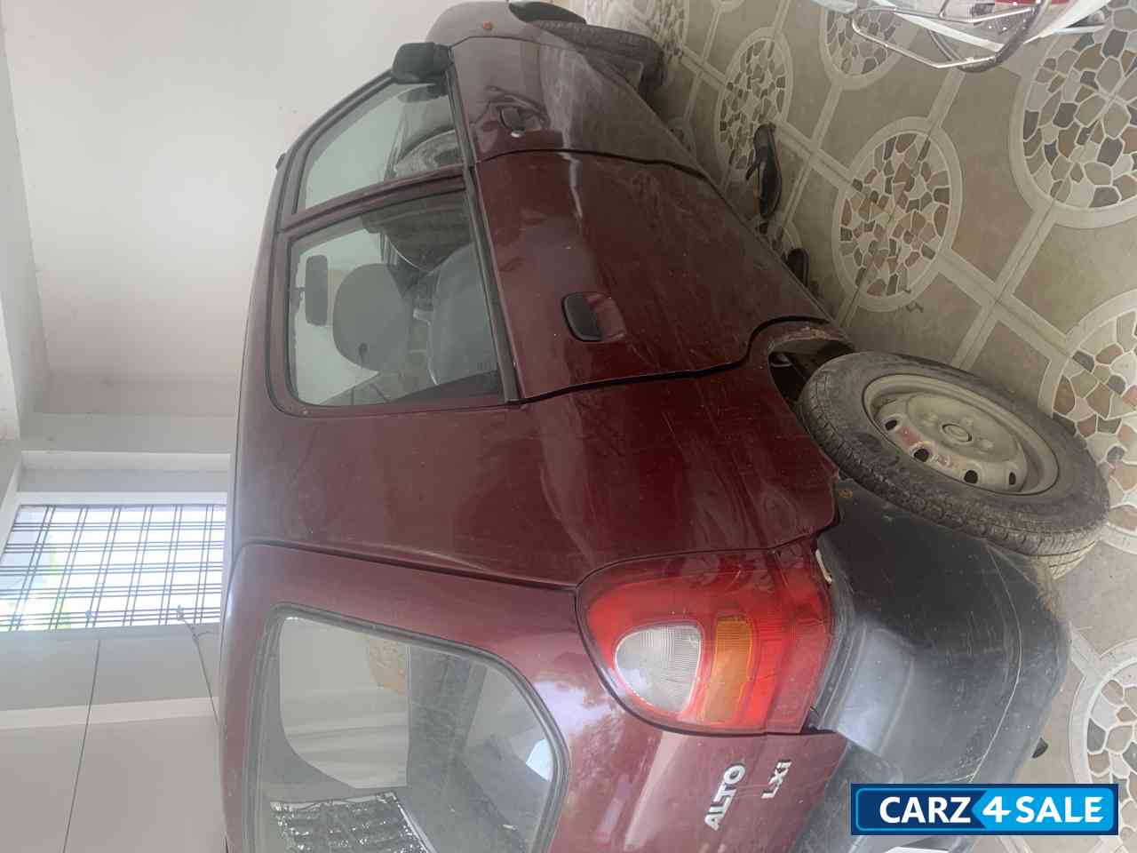 Wine Red Maruti Suzuki LXI