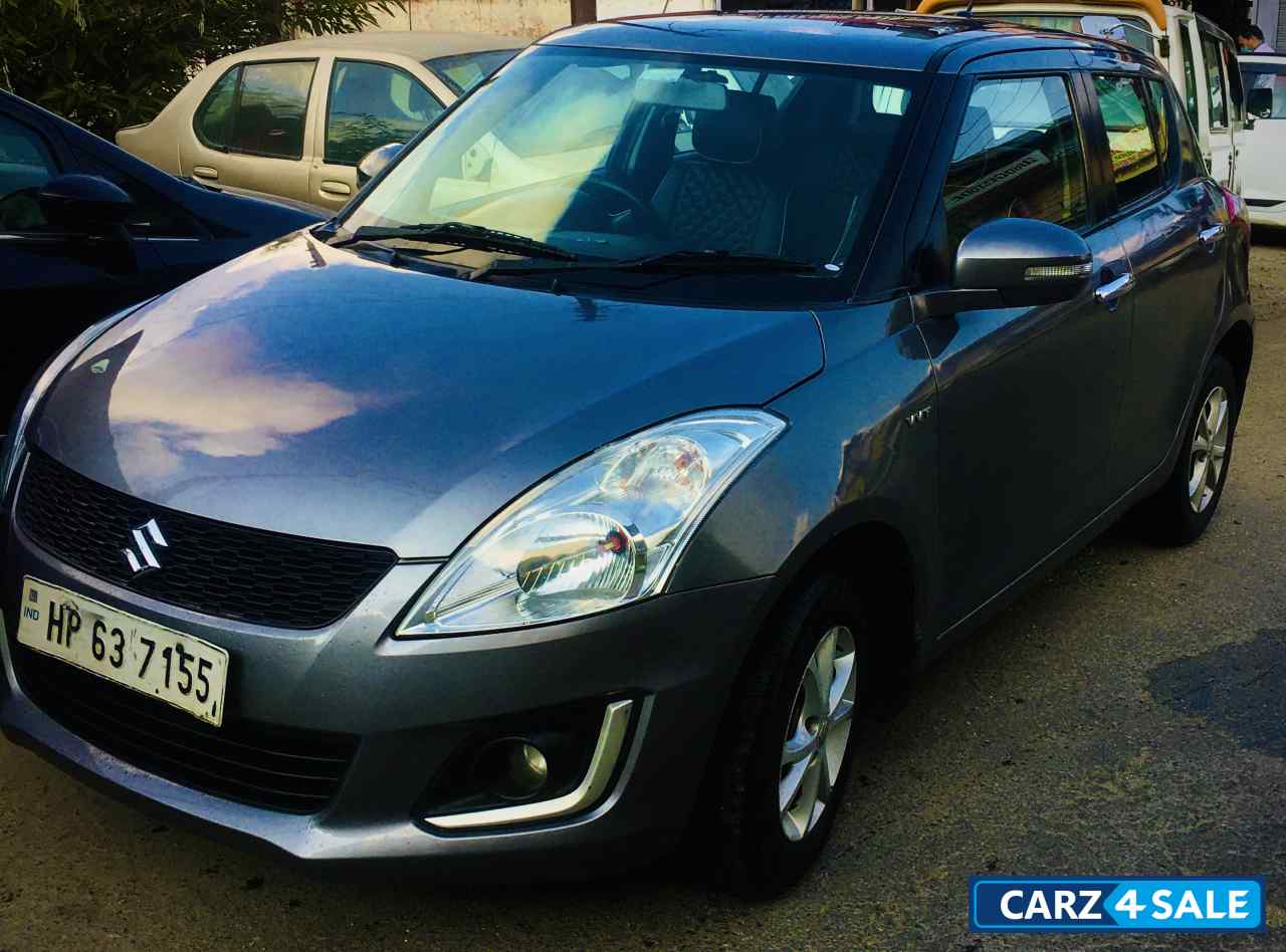 Glistening Grey Maruti Suzuki Swift VXI