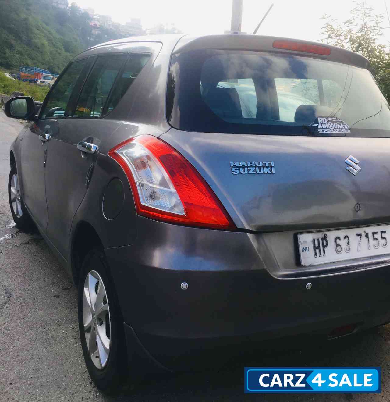 Glistening Grey Maruti Suzuki Swift VXI