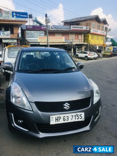 Glistening Grey Maruti Suzuki Swift VXI