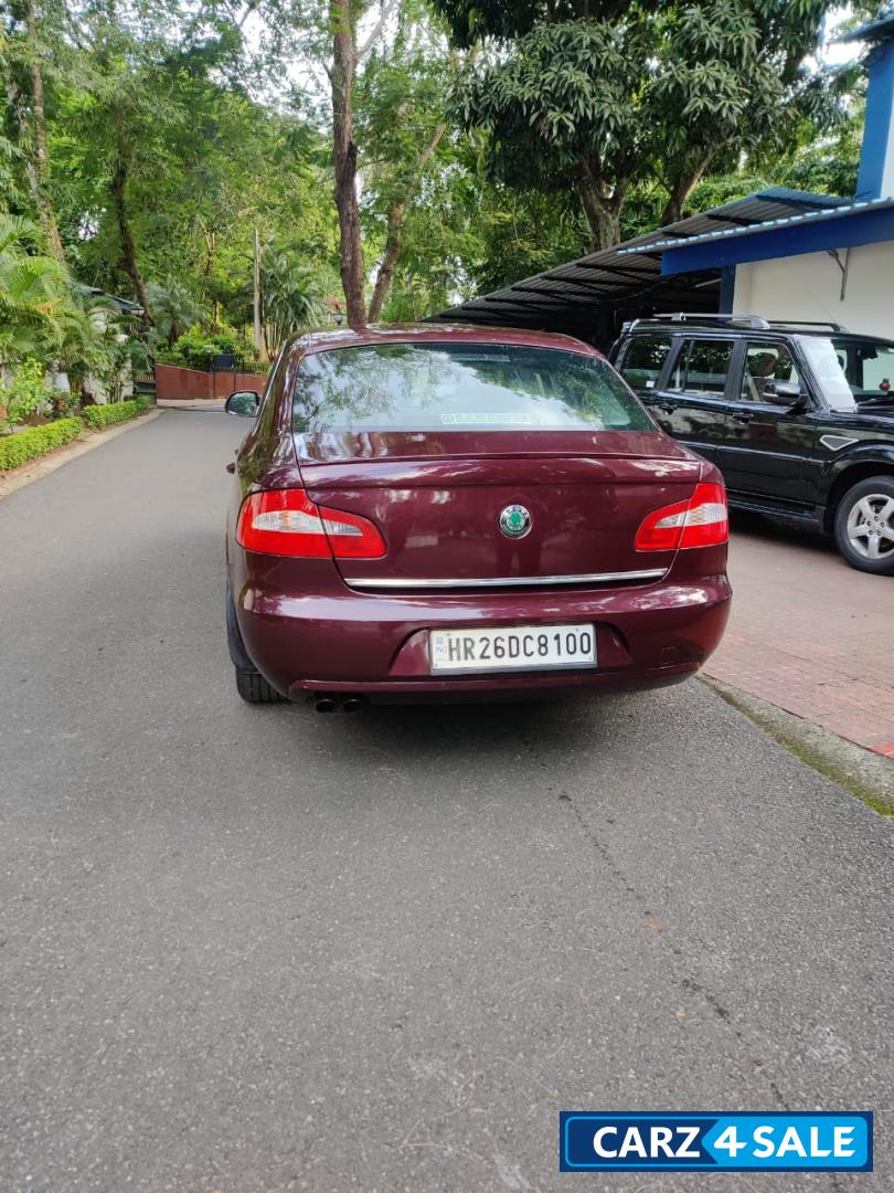Maroon Skoda Superb 2.0 TDI PD