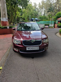 Maroon Skoda Superb 2.0 TDI PD