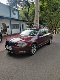 Maroon Skoda Superb 2.0 TDI PD