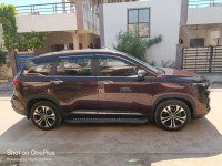 Burgundy Red MG Hector Plus Sharp Petrol Hybrid 6 Seater