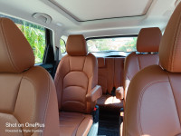 Burgundy Red MG Hector Plus Sharp Petrol Hybrid 6 Seater