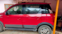 Molten Red Mahindra NuvoSport N8
