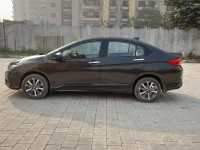 Golden Brown Honda City 1.5 V MT