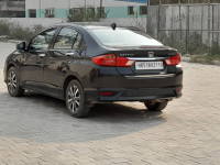 Golden Brown Honda City 1.5 V MT