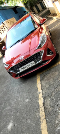 Fiery Red Hyundai Aura 1.2L Kappa Petrol AMT SX Plus