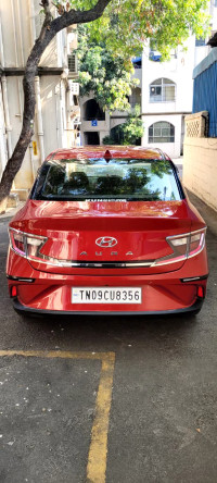Fiery Red Hyundai Aura 1.2L Kappa Petrol AMT SX Plus