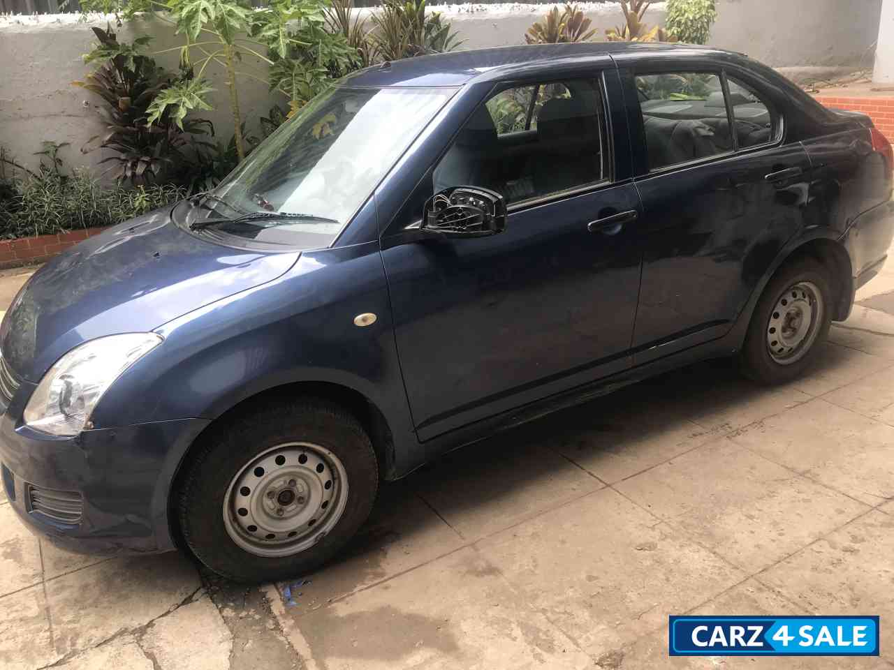 S. Blue Maruti Suzuki Dzire Petrol