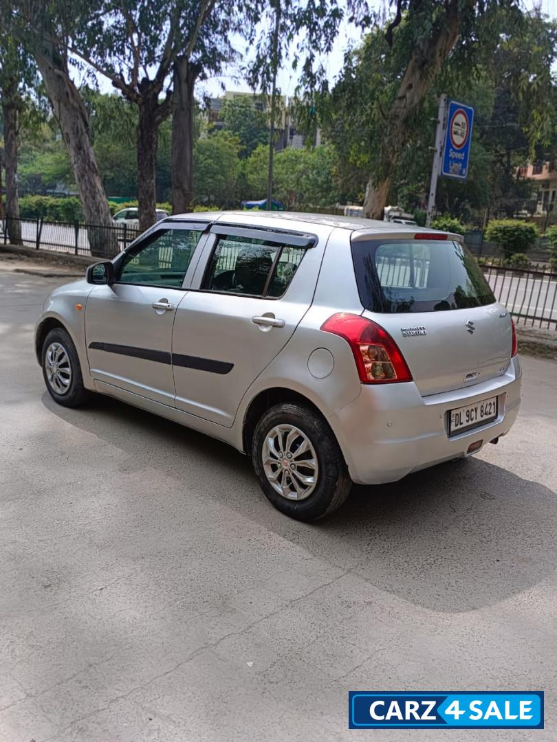 Silver Maruti Suzuki Swift LXI